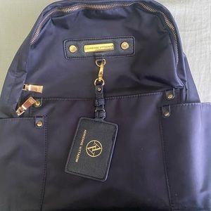 Adrienne Vittadini black backpack.